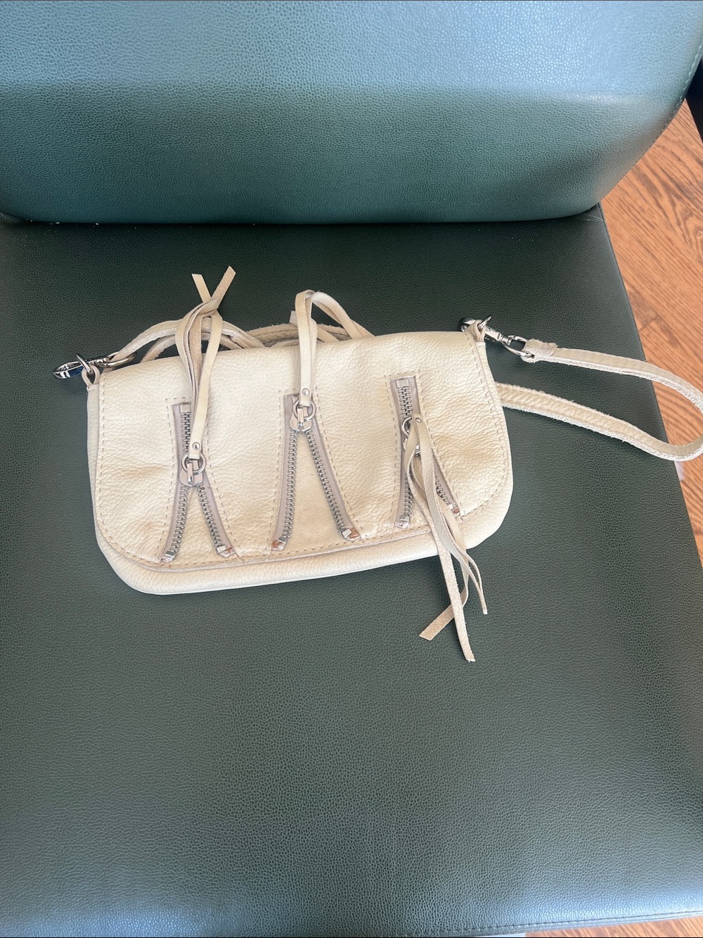 Linea pelle white zipper bag with strap